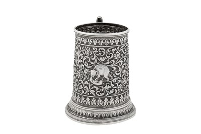 Lot 121 - A late 19th century Anglo – Indian silver mug, Cutch, Bhuj circa 1890 by Oomersi Mawji (active circa 1860-90)