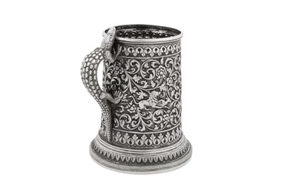 Lot 121 - A late 19th century Anglo – Indian silver mug, Cutch, Bhuj circa 1890 by Oomersi Mawji (active circa 1860-90)