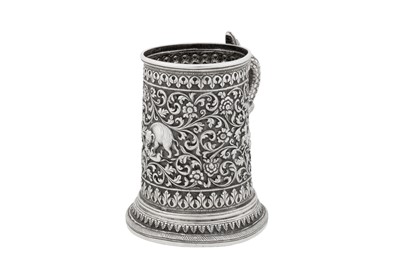 Lot 121 - A late 19th century Anglo – Indian silver mug, Cutch, Bhuj circa 1890 by Oomersi Mawji (active circa 1860-90)