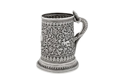 Lot 121 - A late 19th century Anglo – Indian silver mug, Cutch, Bhuj circa 1890 by Oomersi Mawji (active circa 1860-90)