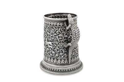 Lot 121 - A late 19th century Anglo – Indian silver mug, Cutch, Bhuj circa 1890 by Oomersi Mawji (active circa 1860-90)