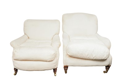 Lot 69 - A near pair of deep seated upholstered Howard & Sons armchairs, early 20th Century