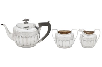Lot 409 - A Victorian sterling silver three-piece bachelor tea service, Sheffield 1890 by Albert Henry Thompson