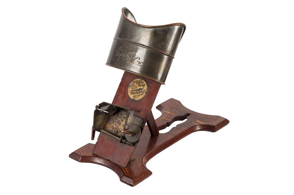 Lot 32 - A Tabletop Kinora Viewer with a Selection of Reels