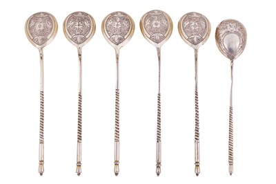 Lot 246 - Five Alexander III Russian 84 zolotnik silver gilt teaspoons, Moscow 1881, maker’s mark obcured