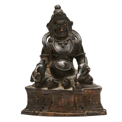 Lot 531 - A Sino-Tibetan bronze figure of Jambhala, Qing dynasty, 18th century