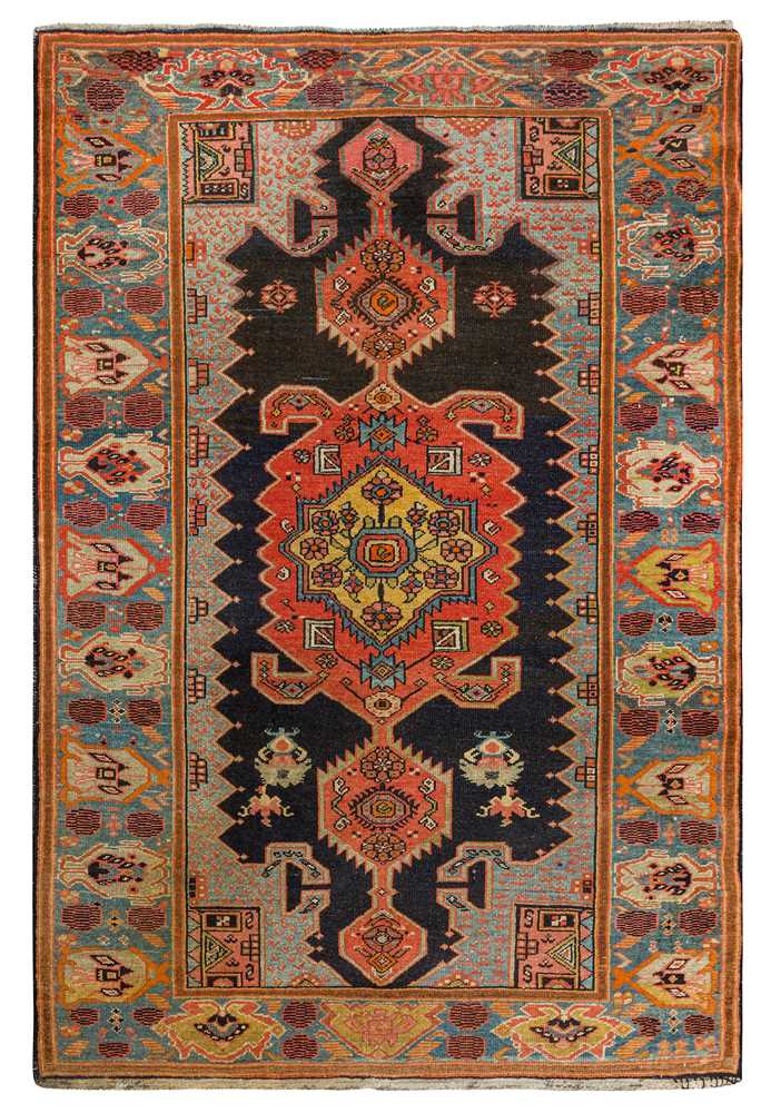 Lot 69 - AN UNUSUAL ANTIQUE WEST PERSIAN RUG