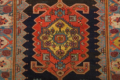 Lot 69 - AN UNUSUAL ANTIQUE WEST PERSIAN RUG