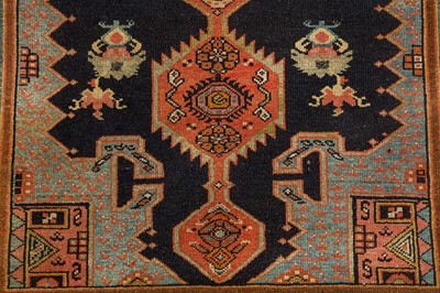 Lot 69 - AN UNUSUAL ANTIQUE WEST PERSIAN RUG