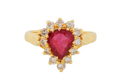 Lot 180 - A RUBY AND DIAMOND CLUSTER RING