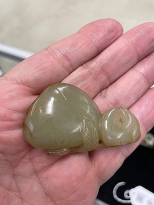 Lot 126 - A GROUP OF SEVEN CHINESE 'ANIMAL AND FRUITS' JADE CARVINGS