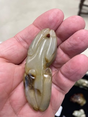 Lot 126 - A GROUP OF SEVEN CHINESE 'ANIMAL AND FRUITS' JADE CARVINGS
