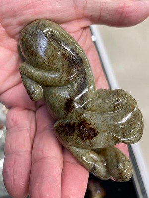 Lot 126 - A GROUP OF SEVEN CHINESE 'ANIMAL AND FRUITS' JADE CARVINGS