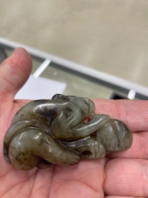 Lot 126 - A GROUP OF SEVEN CHINESE 'ANIMAL AND FRUITS' JADE CARVINGS