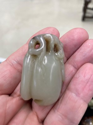 Lot 126 - A GROUP OF SEVEN CHINESE 'ANIMAL AND FRUITS' JADE CARVINGS