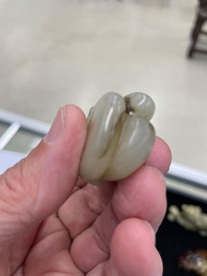 Lot 126 - A GROUP OF SEVEN CHINESE 'ANIMAL AND FRUITS' JADE CARVINGS