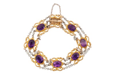 Lot 195 - AN AMETHYST AND SEED PEARL BRACELET