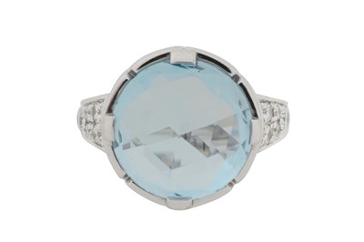 Lot 260 - BULGARI Ι A 'PARENTESI' TOPAZ AND DIAMOND RING