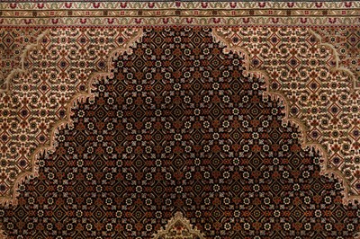 Lot 71 - A FINE INDO-TABRIZ CARPET