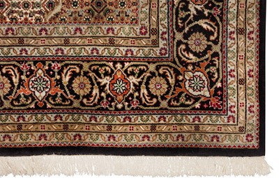 Lot 71 - A FINE INDO-TABRIZ CARPET