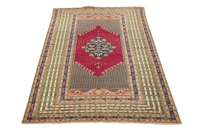 Lot 58 - AN ANTIQUE GHIORDES RUG, TURKEY