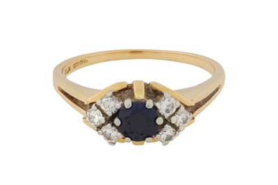 Lot 215 - A SAPPHIRE AND DIAMOND RING, CIRCA 1975