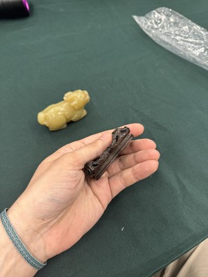 Lot 62 - A CHINESE YELLOW JADE CARVING OF A MYTHICAL BEAST