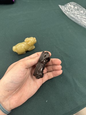Lot 62 - A CHINESE YELLOW JADE CARVING OF A MYTHICAL BEAST