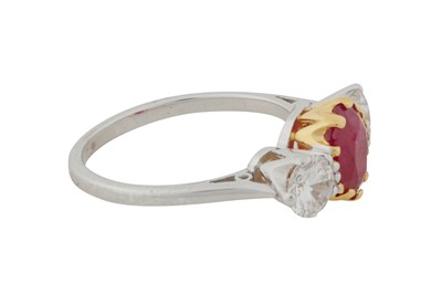 Lot 114 - A RUBY AND DIAMOND THREE-STONE RING, CIRCA 2015