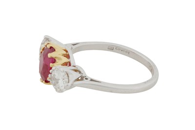 Lot 114 - A RUBY AND DIAMOND THREE-STONE RING, CIRCA 2015