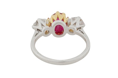 Lot 114 - A RUBY AND DIAMOND THREE-STONE RING, CIRCA 2015