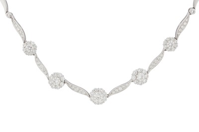 Lot 146 - A DIAMOND FLOWER NECKLACE