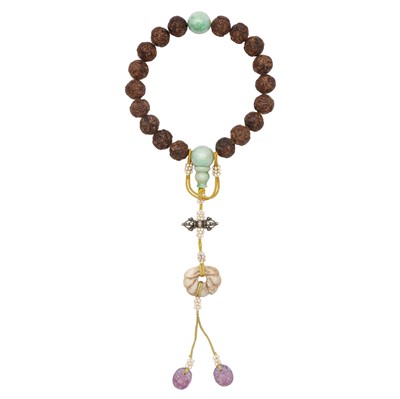 Lot 594 - A Chinese agarwood 'chenxiangmu' and jade rosary, Qing dynasty