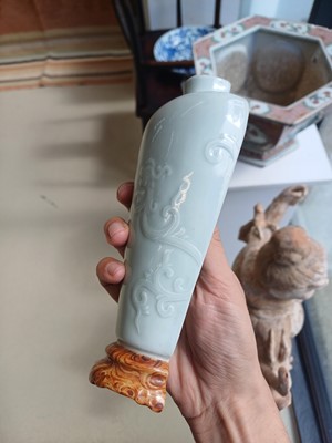 Lot 511 - A Chinese celadon glazed and faux-bois 'chilong' wall vase, 19th/20th century