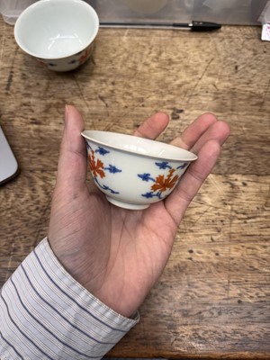 Lot 516 - A pair of Chinese iron-red and underglaze blue 'lotus' bowls, 20th Century