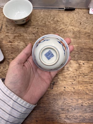 Lot 516 - A pair of Chinese iron-red and underglaze blue 'lotus' bowls, 20th Century