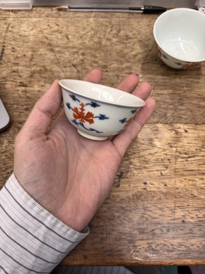 Lot 516 - A pair of Chinese iron-red and underglaze blue 'lotus' bowls, 20th Century