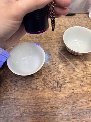 Lot 516 - A pair of Chinese iron-red and underglaze blue 'lotus' bowls, 20th Century