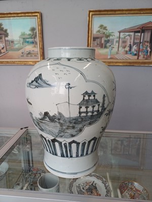 Lot 434 - A LARGE KOREAN BLUE AND WHITE 'LANDSCAPE' VASE