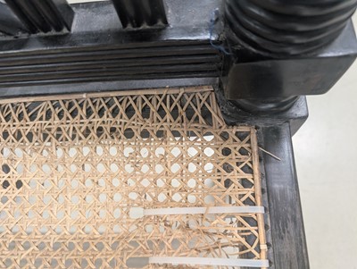 Lot 39 - An early 19th century Ceylon (Sri Lanka) carved and caned ebony sofa