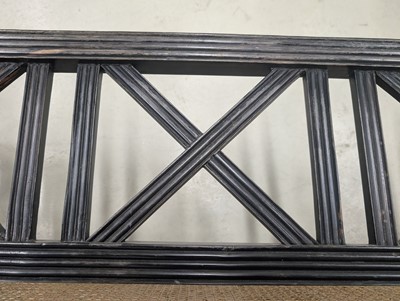 Lot 39 - An early 19th century Ceylon (Sri Lanka) carved and caned ebony sofa