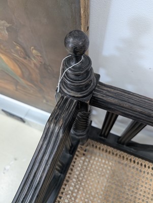 Lot 39 - An early 19th century Ceylon (Sri Lanka) carved and caned ebony sofa