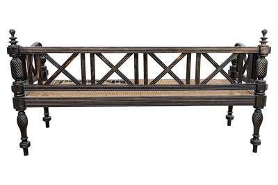 Lot 39 - An early 19th century Ceylon (Sri Lanka) carved and caned ebony sofa