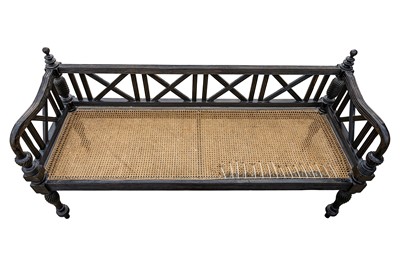 Lot 39 - An early 19th century Ceylon (Sri Lanka) carved and caned ebony sofa