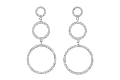 Lot 222 - A pair of diamond triple circle pendant earrings, circa 2004