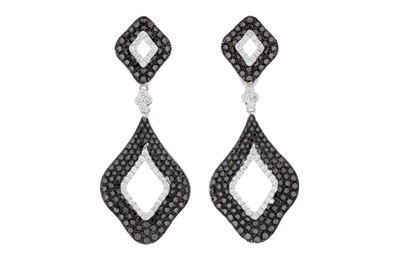 Lot 178 - A pair of black and white diamond earrings