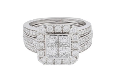 Lot 227 - A diamond cluster double ring