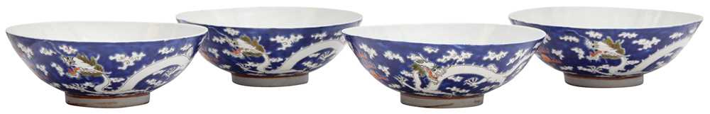 Lot 567 - FOUR CHINESE BLUE-GROUND 'DRAGON' BOWLS