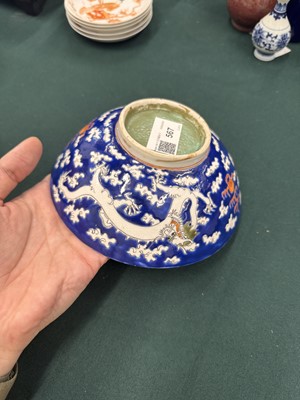 Lot 567 - FOUR CHINESE BLUE-GROUND 'DRAGON' BOWLS