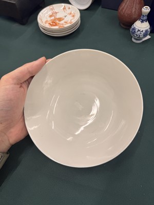 Lot 567 - FOUR CHINESE BLUE-GROUND 'DRAGON' BOWLS